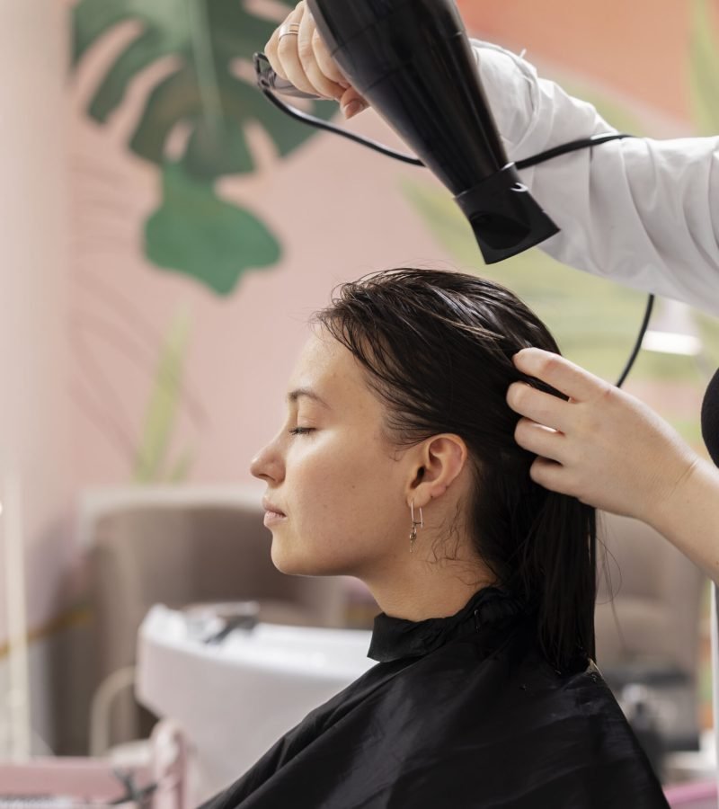 woman-getting-treatment-hairdresser-shop (1)